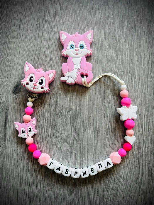 Клипс за биберон с гризалка