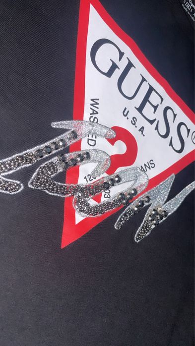 tricou guess icon
