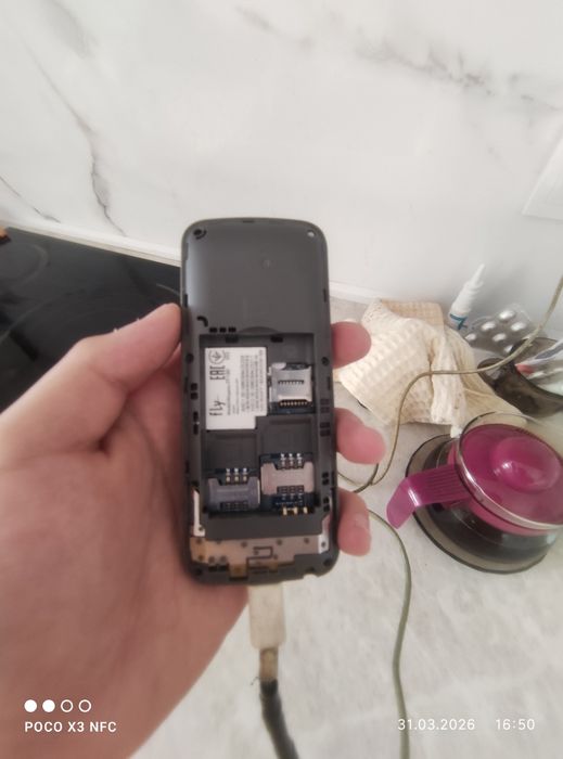 Продам кнопочный телефон fly