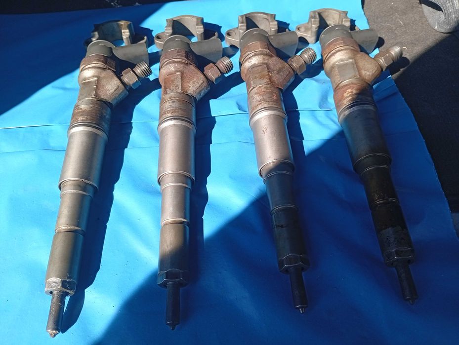 Injectoare bmw x3 163cp