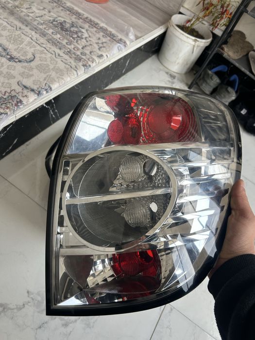 Задний стоп фонарь каптива