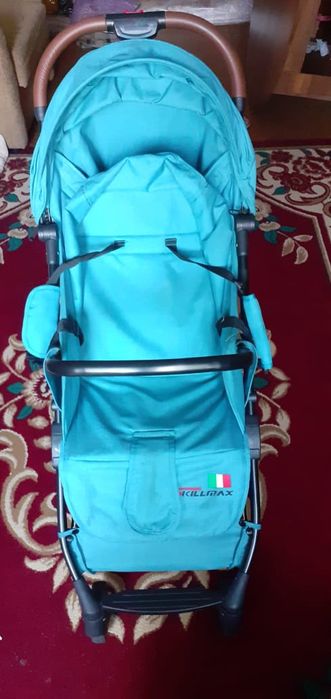 Детская прогулочная коляска всесезонная