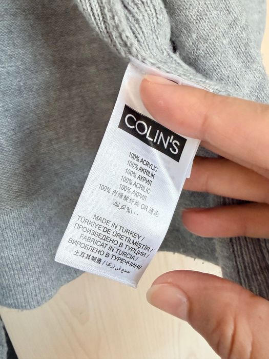 Colin's grey cardigan