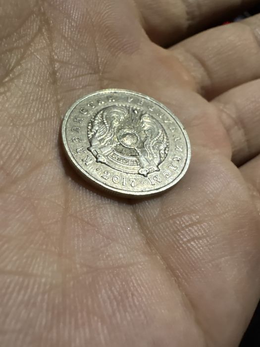 Брак монета 50 тг выпирает герб