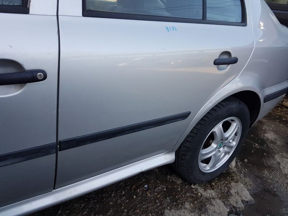 Usa / Portiera Stanga Spate Skoda Octavia 1 Berlina / Sedan 1996 - 2005 Cod Culoare : 9102