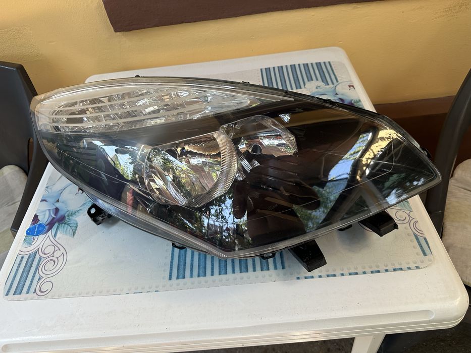 Far stanga Renault Scenic 3 reglaj electric