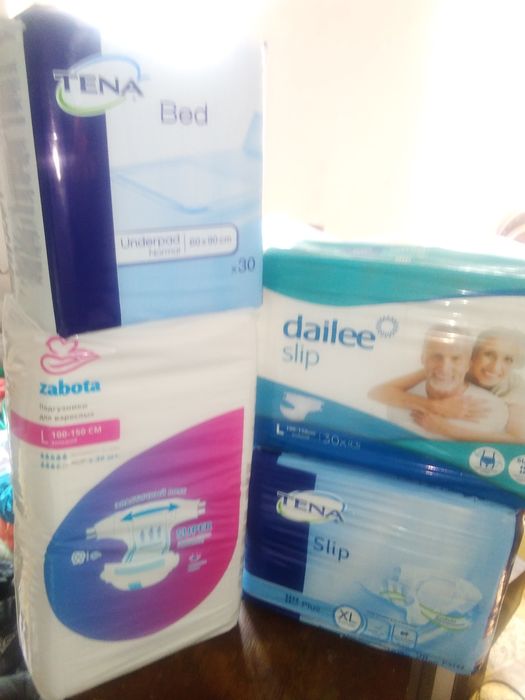 Продам памперсы и пеленки