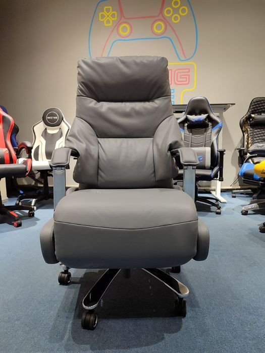 Кресло для руководителя электро регулировкой и вибромассажем.