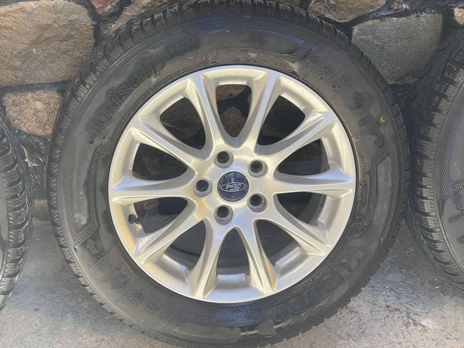 Jante cu cauciucuri de iarna ford 5x108 ET 50