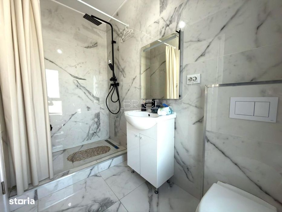 Casa, 90mp, 3 camere, 3 bai, cu Garaj si Curte