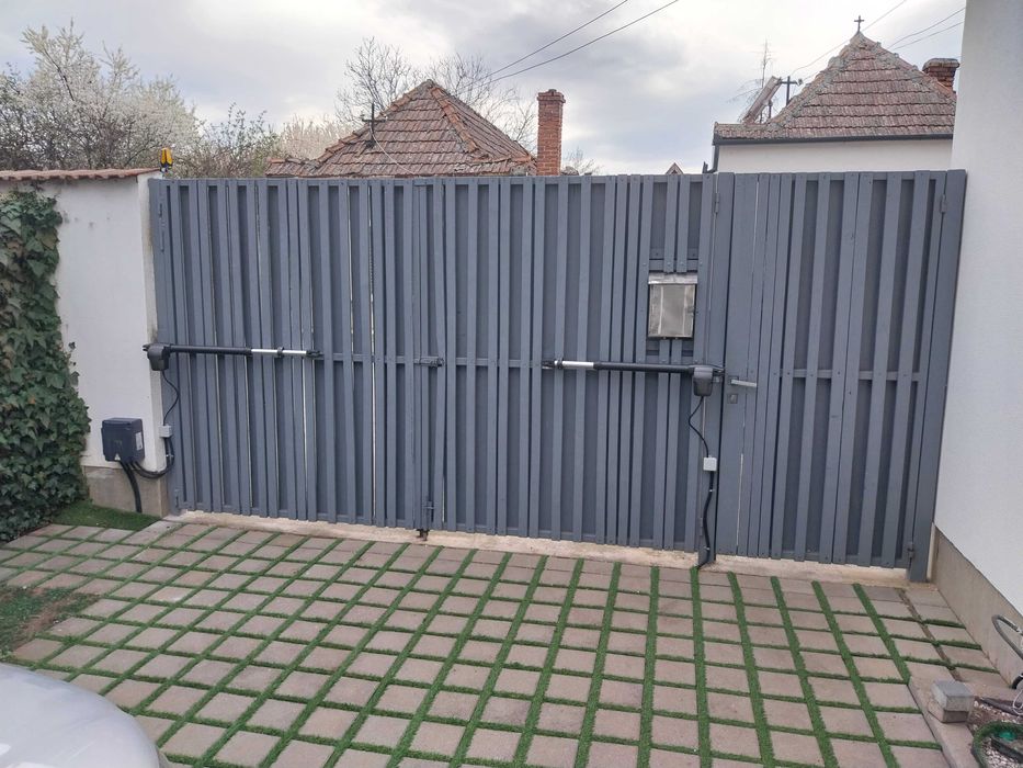 Usi de garaj sectionale si automatizari pentru porti
