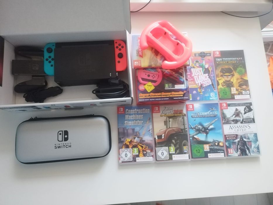 Consolă Nintendo Switch + 7 Jocuri incluse + Husă (Pachet Complet