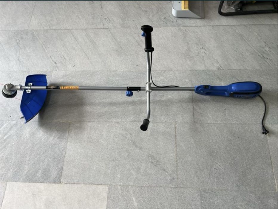 Триммер газонакасилка электрический