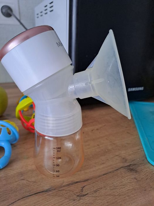 Молокоотсос электронный