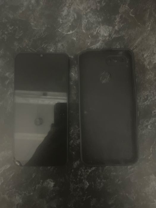 Oppo A12.