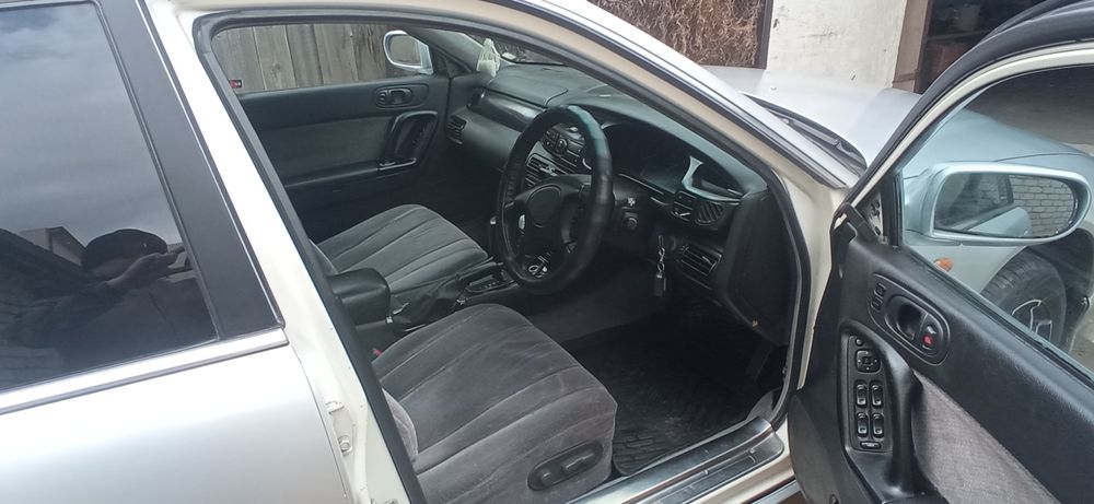 Продам  Мазду Einos