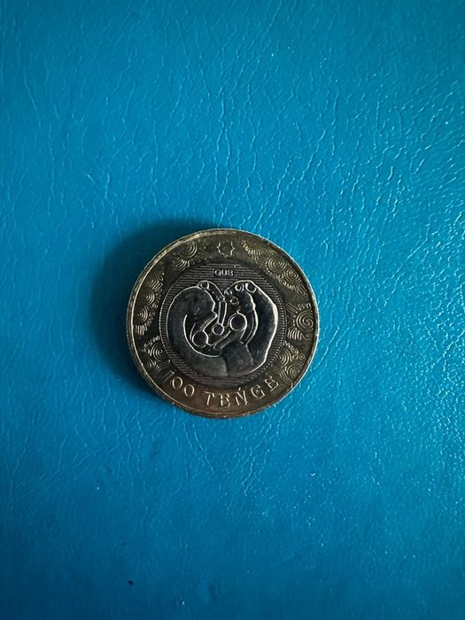 Монета 100 тг...