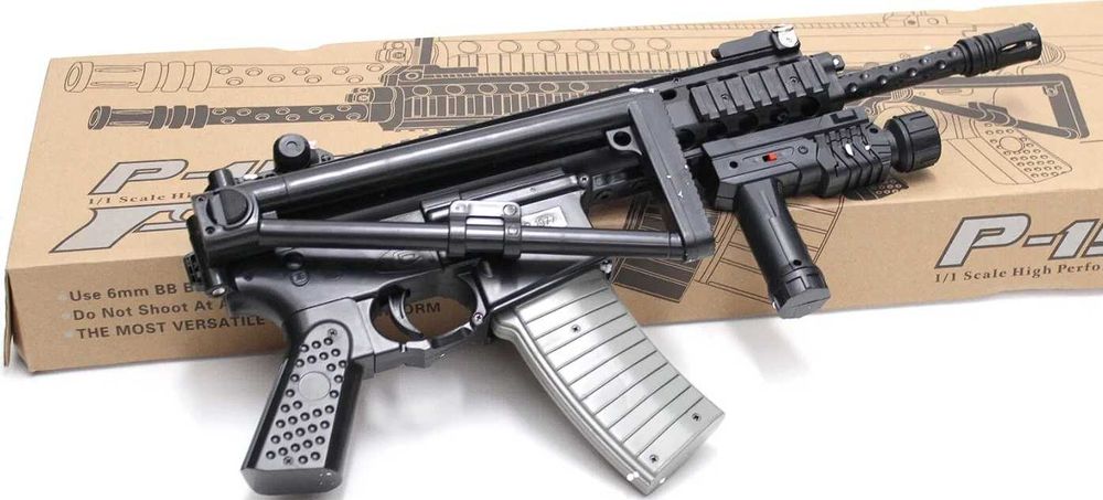 Игрушка автомат стреляет пульками