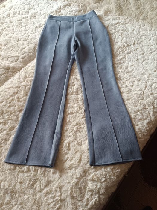 Новые Брюки клешь