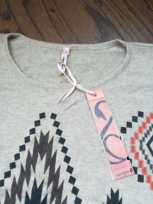 Ново цветно пончо