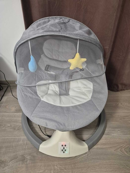 Balansoar electric cu telecomanda si melodii pentru belelusi!