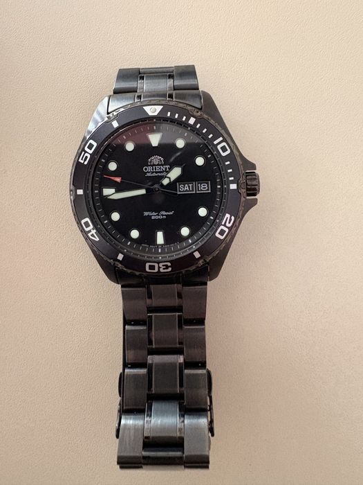 Orient Ray Raven Black PVD coated new with papers