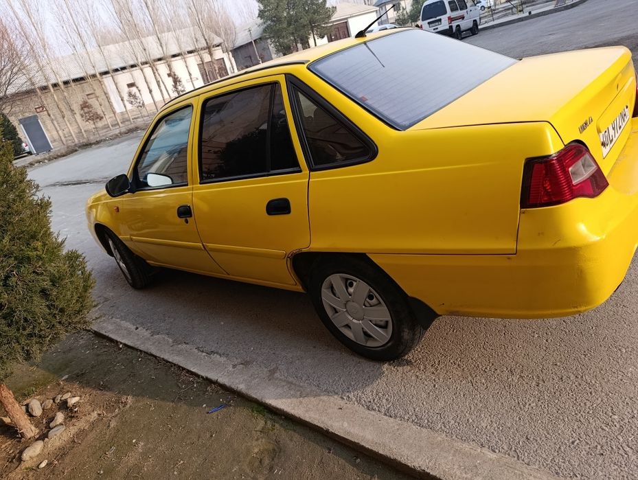 Neksiya 2 sariq 2009 yil