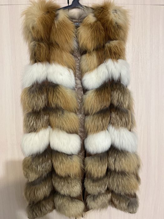 Меховая жилетка