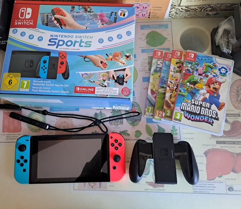 Nintendo switch cu 4 jocurii incluse(citiți descrierea!)