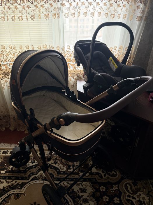 Детская коляска с автолюлькой