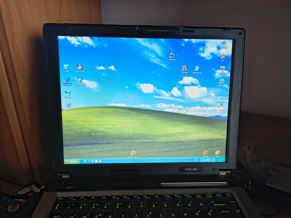 Vind Asus    A6000