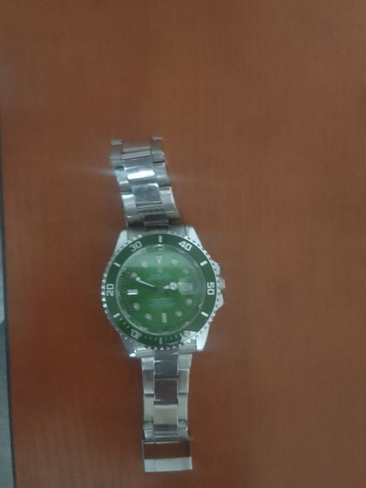 Apple watch, Rolex watch