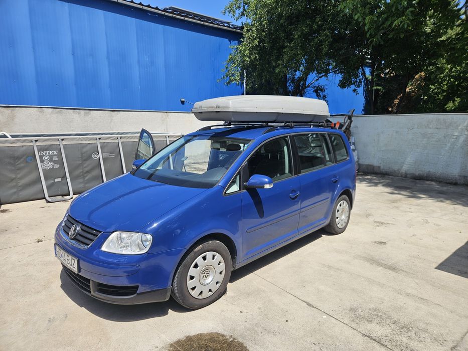Vw touran 7 locuri 1.6 fsi 115 cp stare foarte buna ingrijita accept orice test 260 mii km