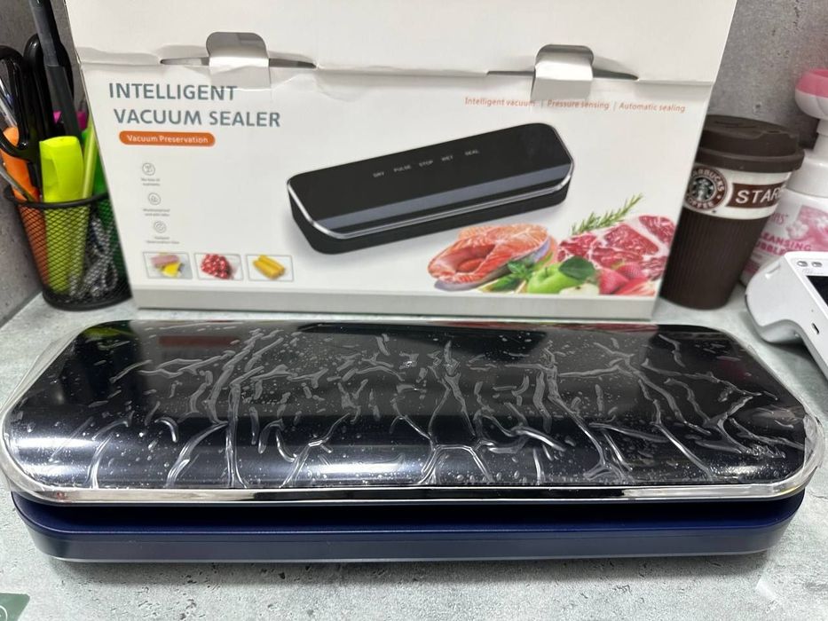Вакуумный упаковщик.