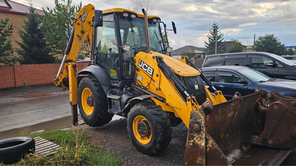 Экскаватор- погрузчик 3в 1