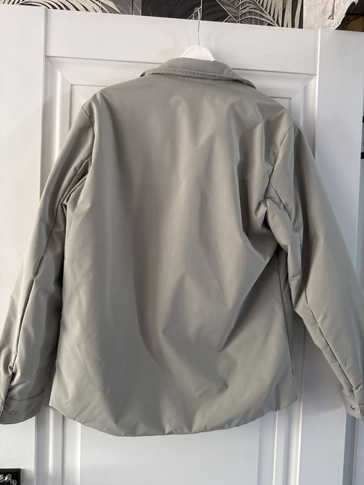 Куртка темна зеленая