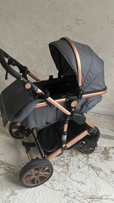 Коляска.         Ь