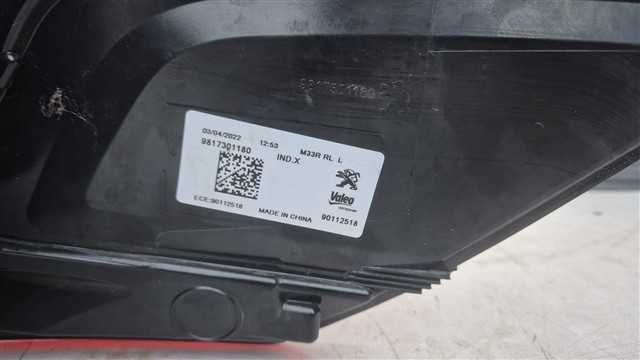 Stop Lampa Stanga spate pe aripa Peugeot 301 cod 9817301180