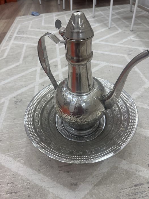 Құман, тазигімен