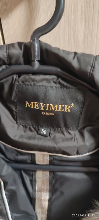 Продам пуховик женский