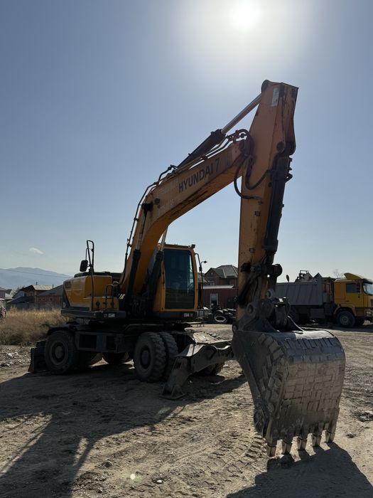 Услуги экскаватора бобката мини погрузчик