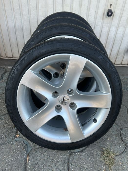 Jante aliaj 4x108mm, anvelope vara 215/45 R17, Peugeot 206, 207, 307, 308, Partner, Citroen, Ford