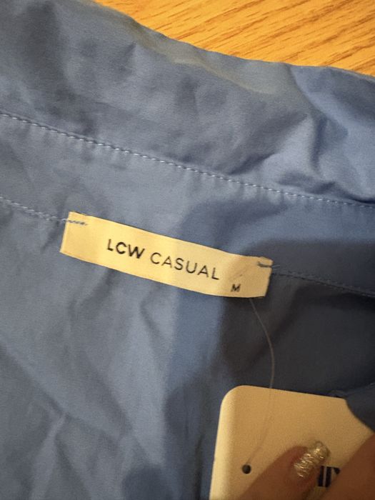 Къса синьа пролетна риза с дълъг ръкав чисто нова