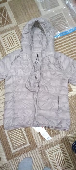 Продам пуховик новый