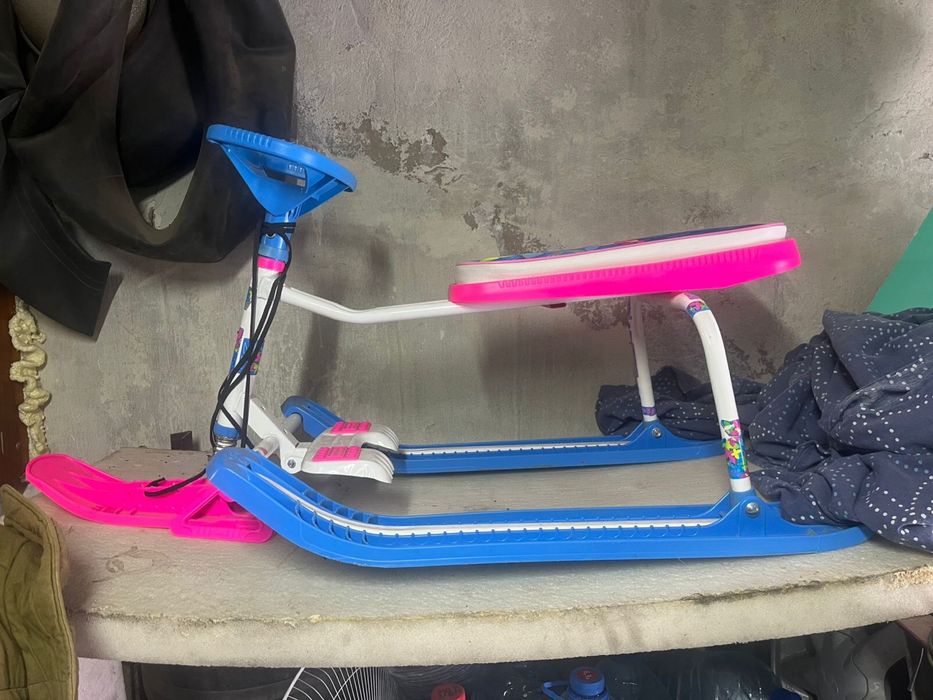 Продам снегокат новый