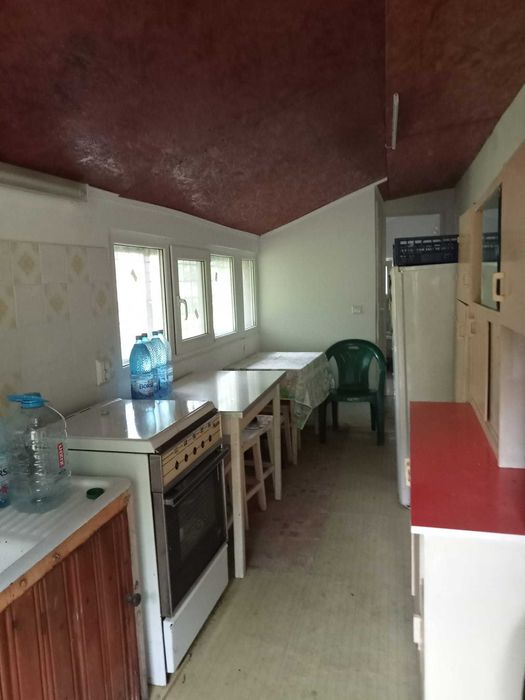 Vand teren cu casa