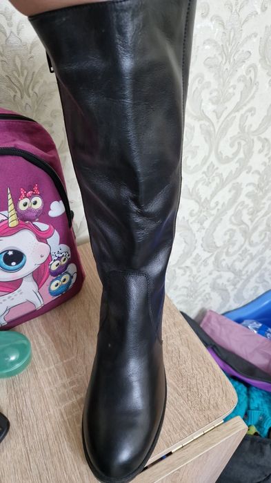 Продам женский сапоги