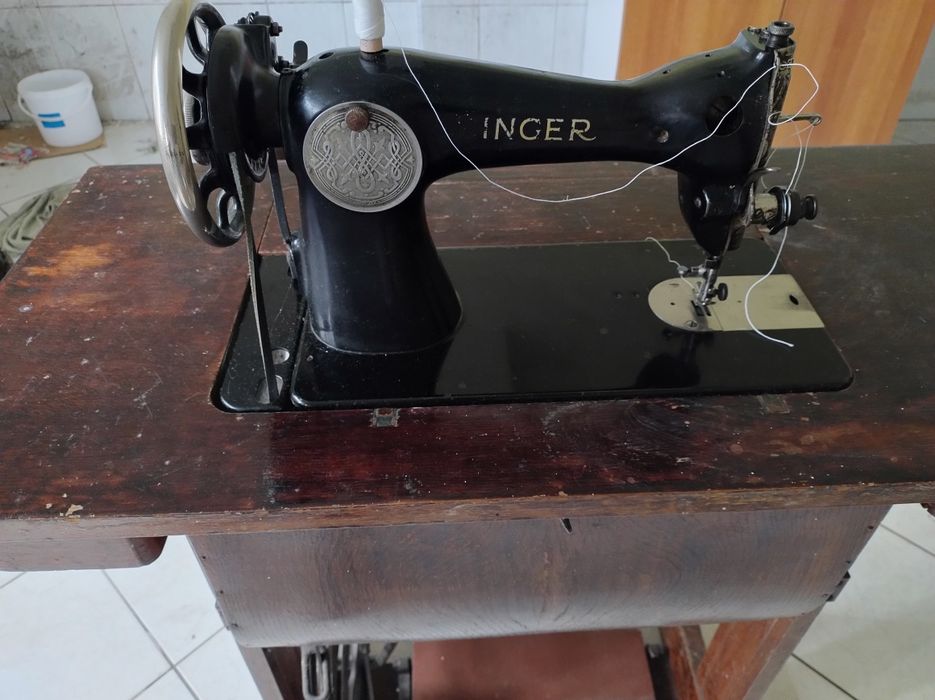 Mașină de cusut Singer