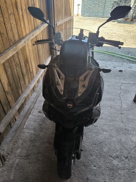 Vând sau schimb sym adx 125