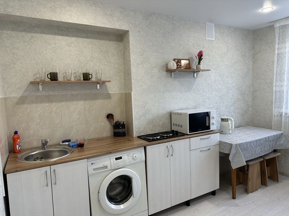 Часы в центре,Манакбай,Мечеть